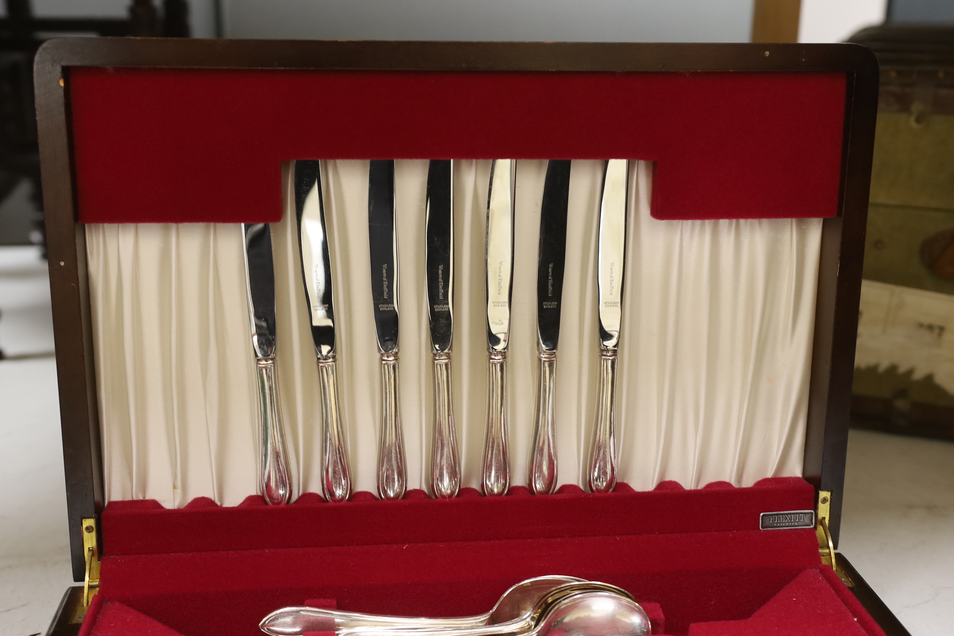 A wooden canteen and Sheffield Viners EPNS cutlery set for eight